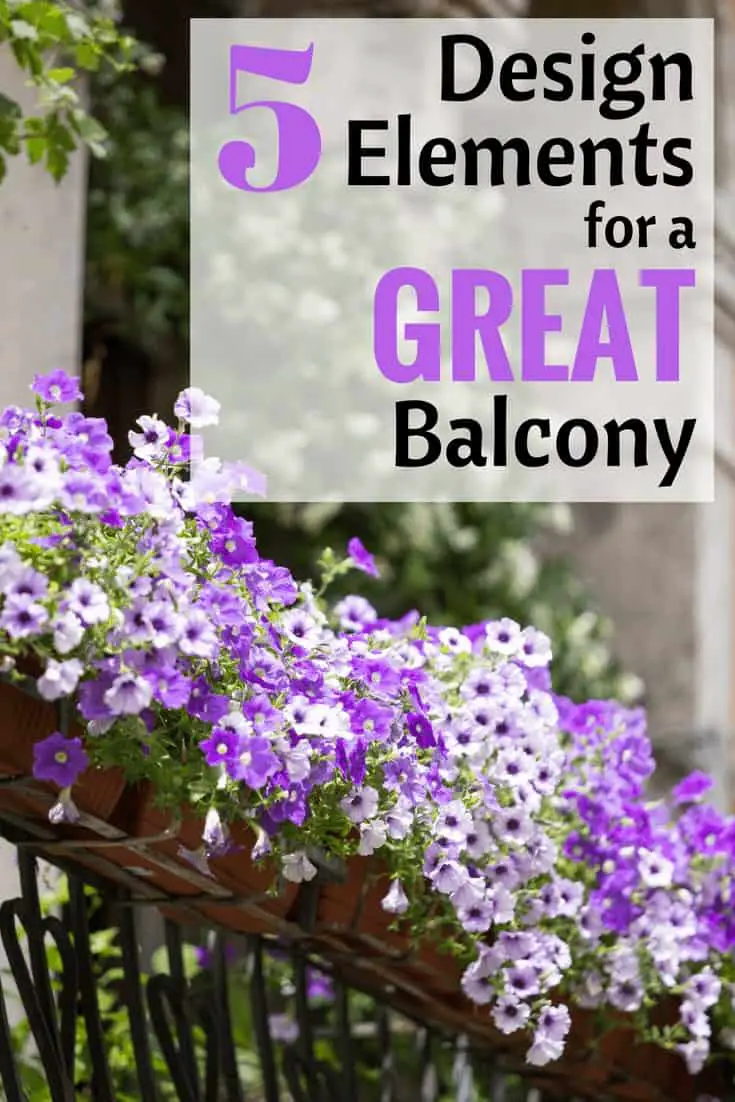 white and purple flowers as a balcony decoration in a flower box