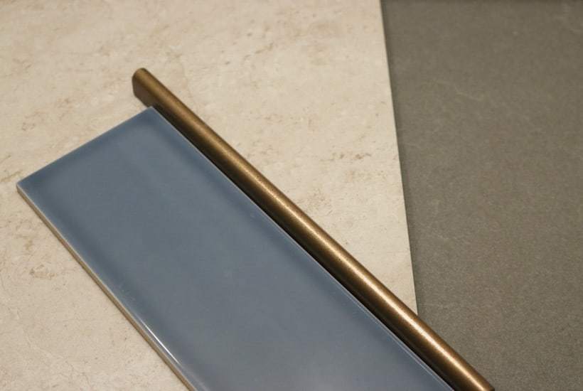 Blue, grey & cream materials for a bathroom remodel