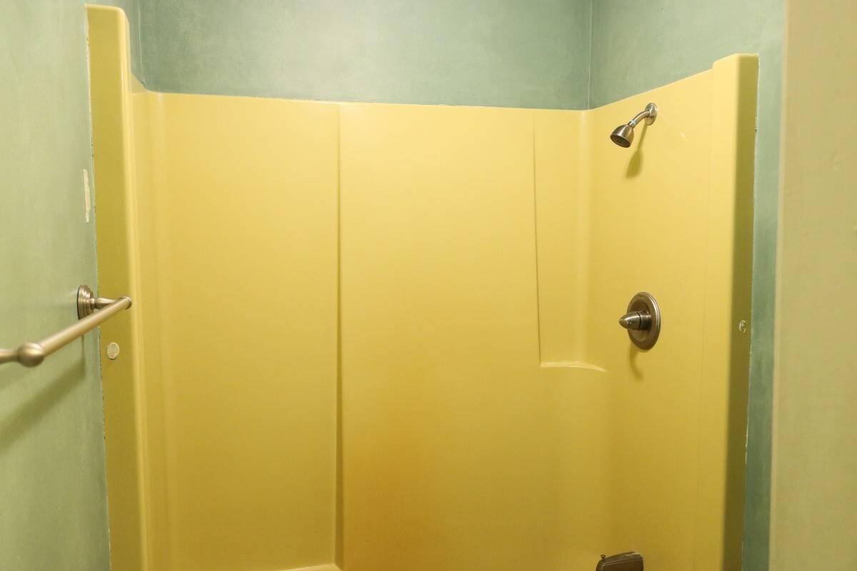 Photo of 1970's Harvest Gold shower surround