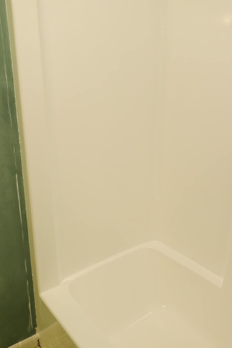 Photo of white tub & shower unit - after DIY bathtub refinishing project