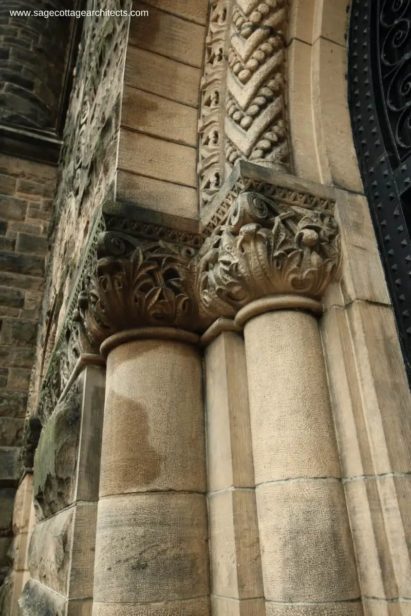 Carved limestone capitals and archway on a Richardsonian Romanesque building