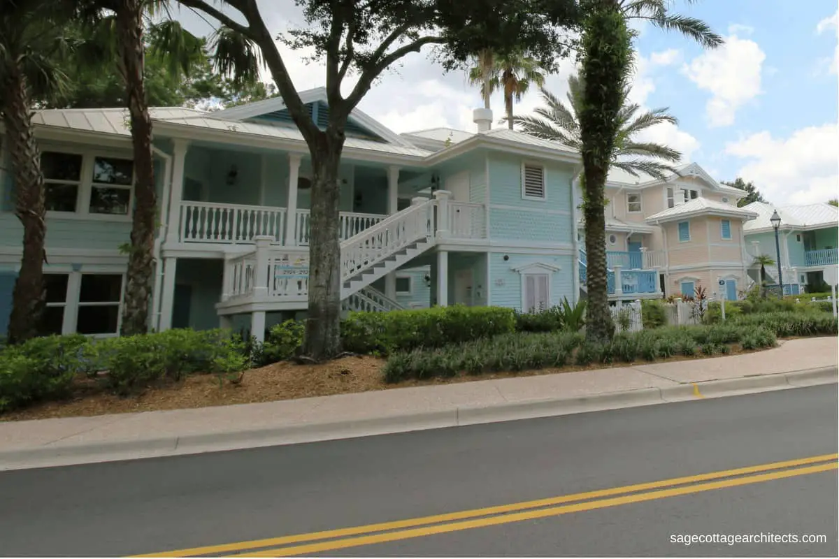 Mint green hotel building with white gingerbread at Disney's Old Key West Resort.