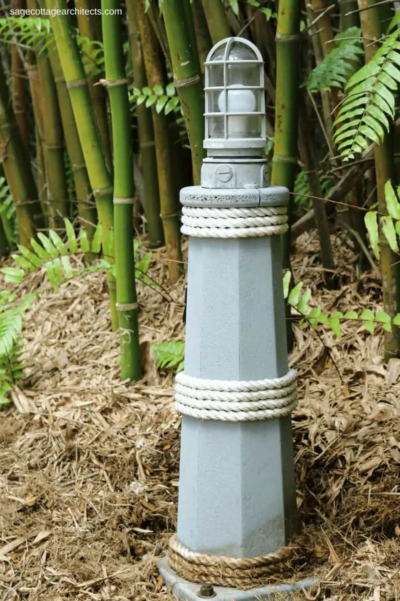 Nautical style light bollard in front of foliage at Disney's Old Key West Resort