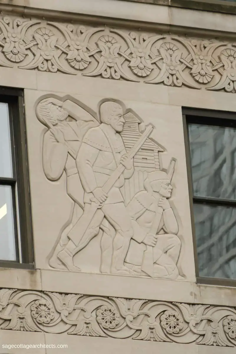 Art Deco panel with relief carving of frontiersmen fighting in front of a fort