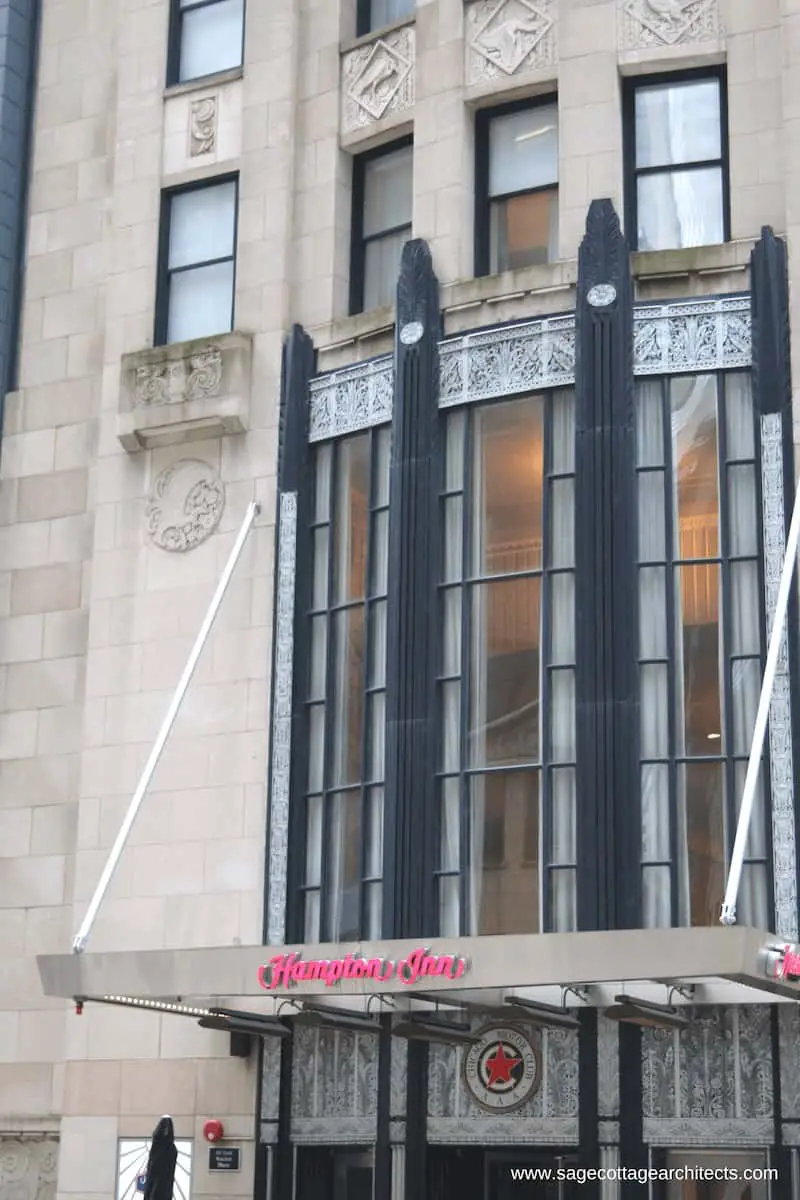 Art Deco exterior with limestone cladding, black columns and nickel decorative spandrel panels.