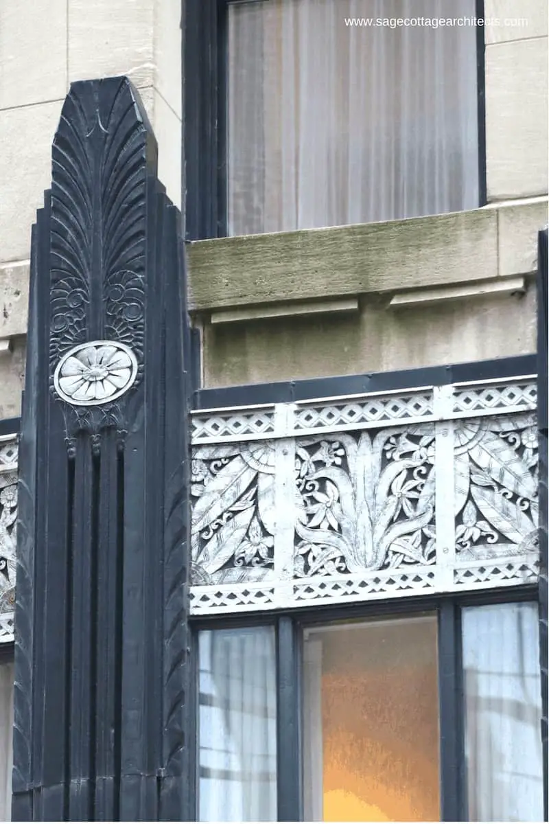 Black Art Deco decorative column, nickel relief panel, and limestone wall