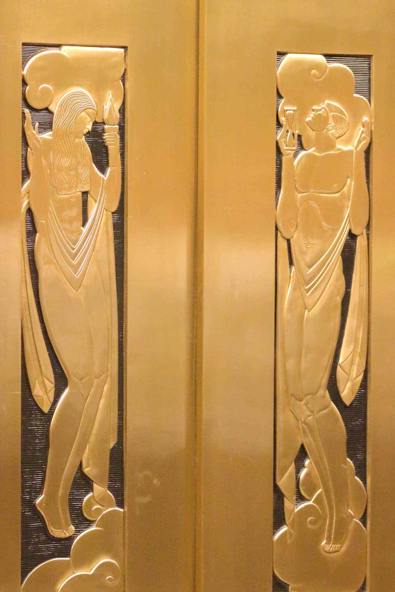 Photo of bronze Art Deco elevator door panels.