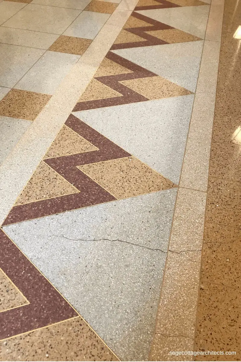 Art Deco style terrazzo floors in a chevron design. 