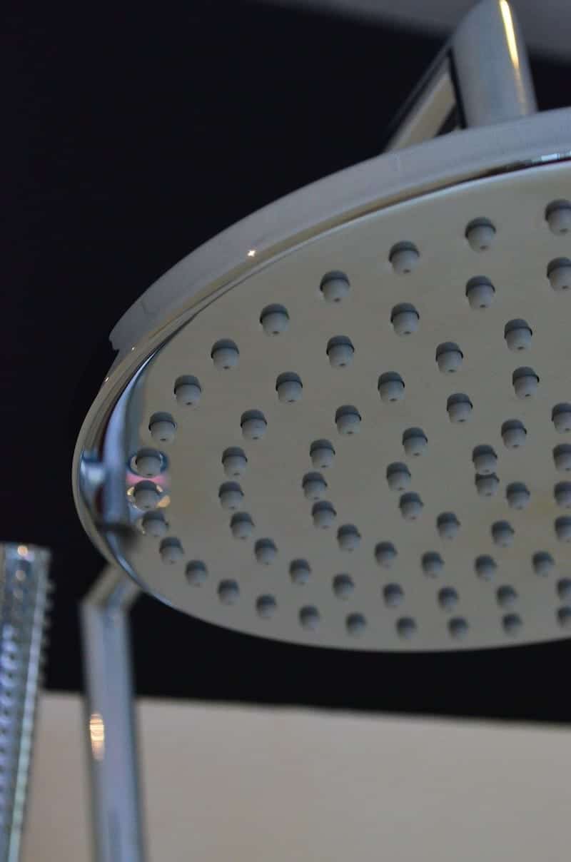 Close up of a rain shower head that is perfect for curbless showers.