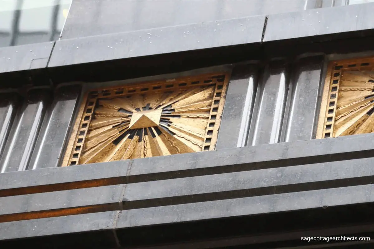 Gold plated Art Deco sunburst panel in dark grey terra cotta panel