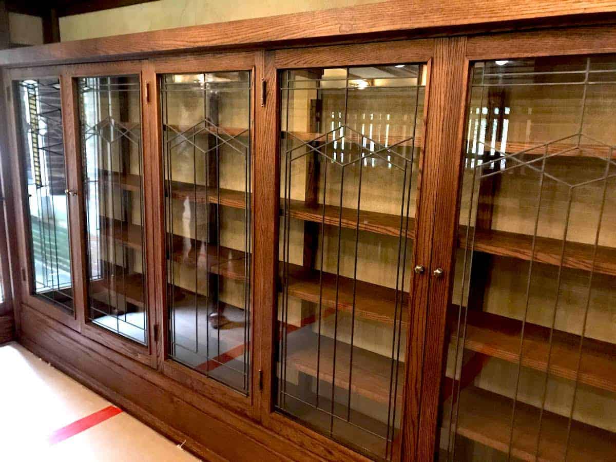 Prairie stye oak book cases with glass fronts.