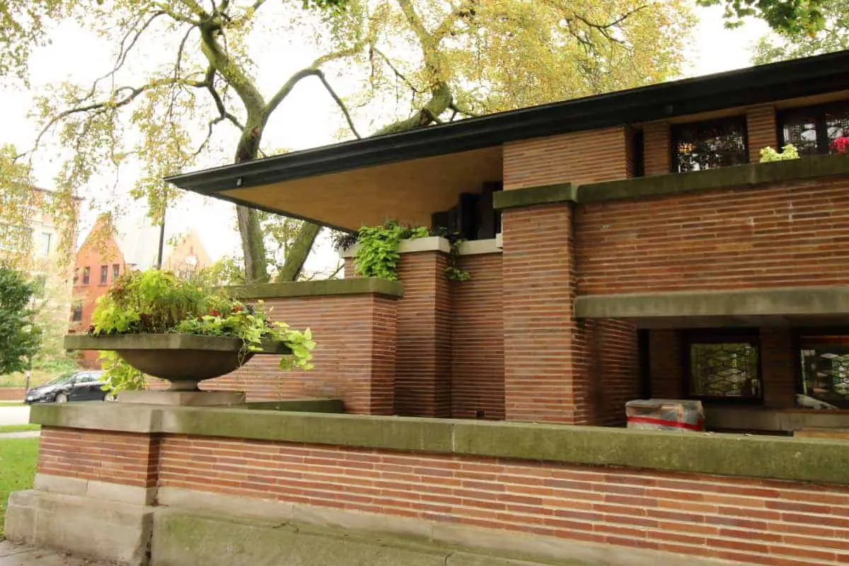 The Robie House in Chicago, with red brick walls, white limestone trim, and cantilevered eaves is the perfect example of Prairie Style homes.