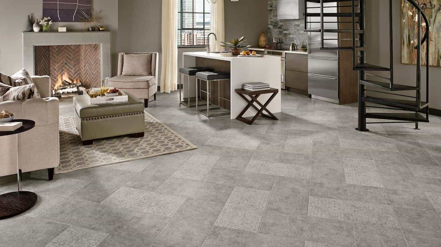 Photo of living room with grey patterned floor made of luxury vinyl tile