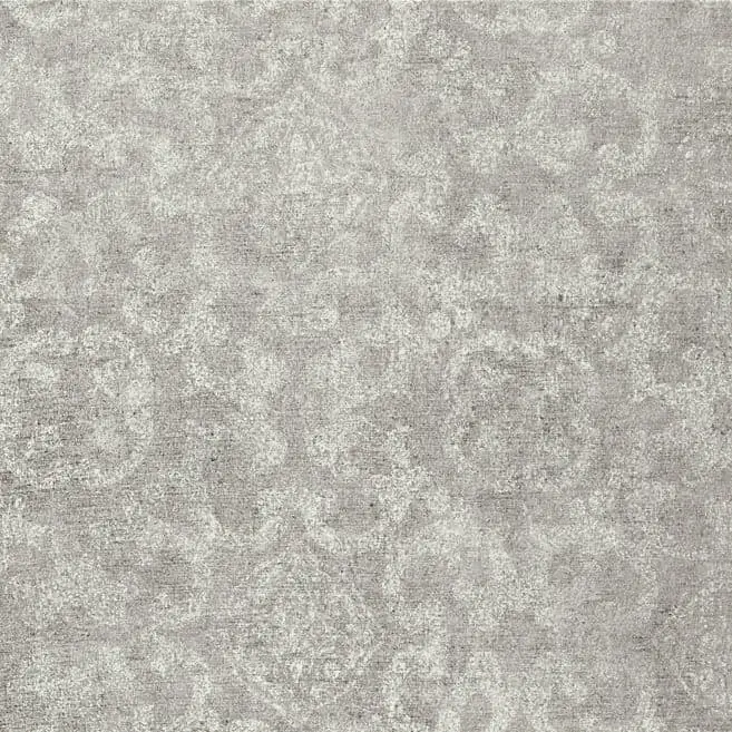 Photo of medium grey colored luxury vinyl tile floor sample with faint light colored pattern