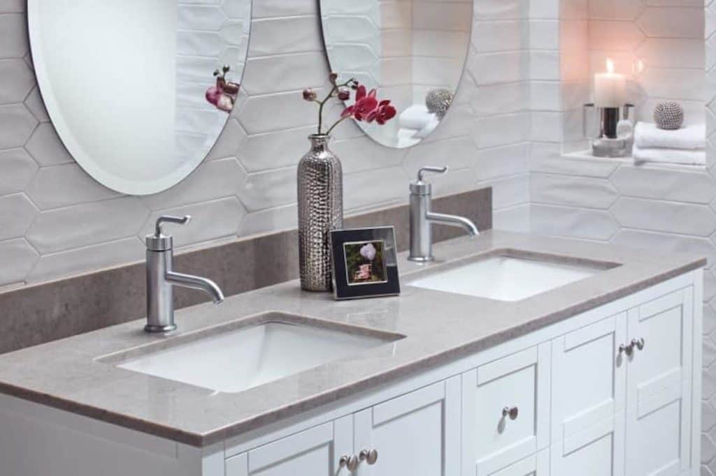 Photo of light grey bathroom vanity with double sinks