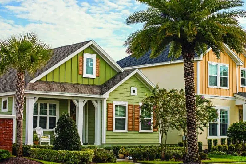 Photo of brightly colored bungalow homes. 