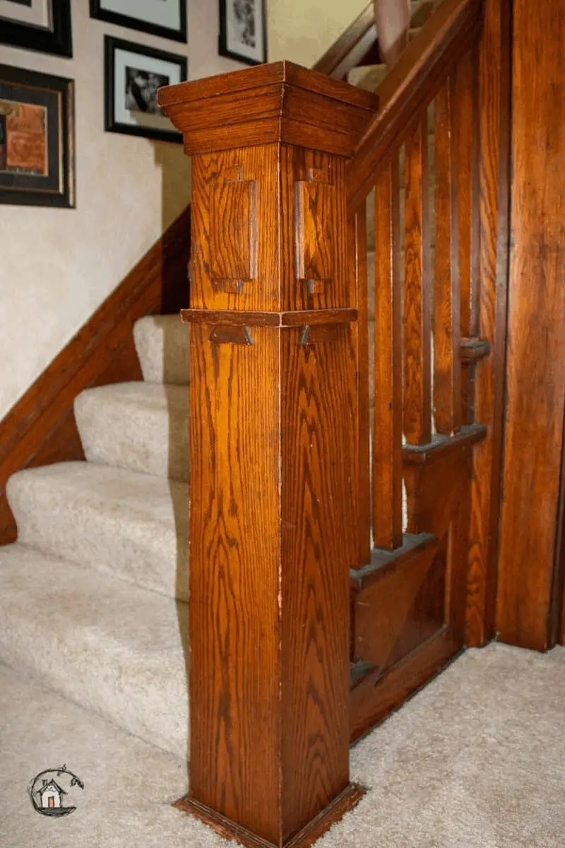 Photo of oak stair newel post on Old House Society Tour. 