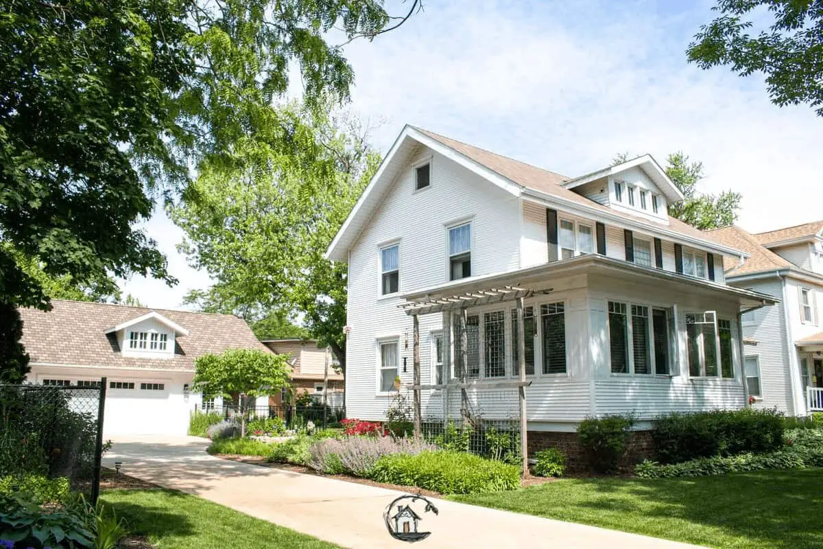 Photo of white American Foursquare home seen on Old House Society Tour