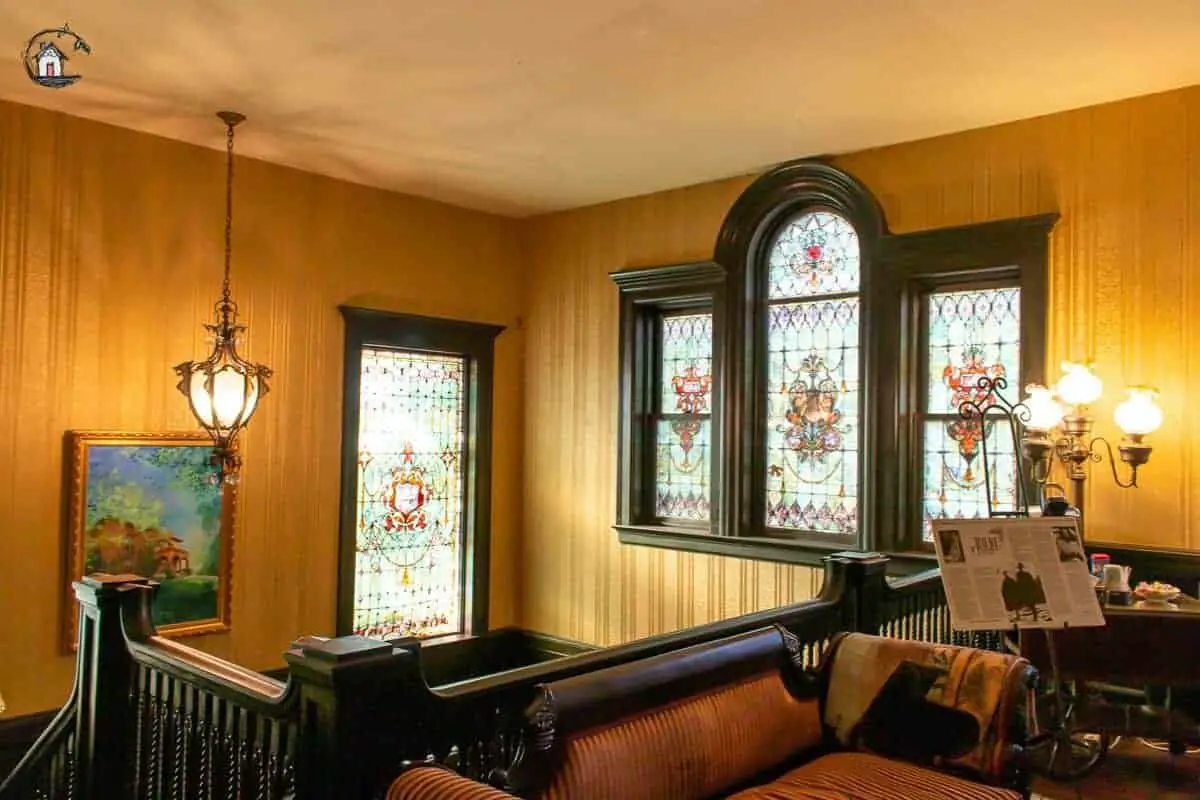 Photo of stained glass Palladian window in the stairway of the Vrooman Mansion. 