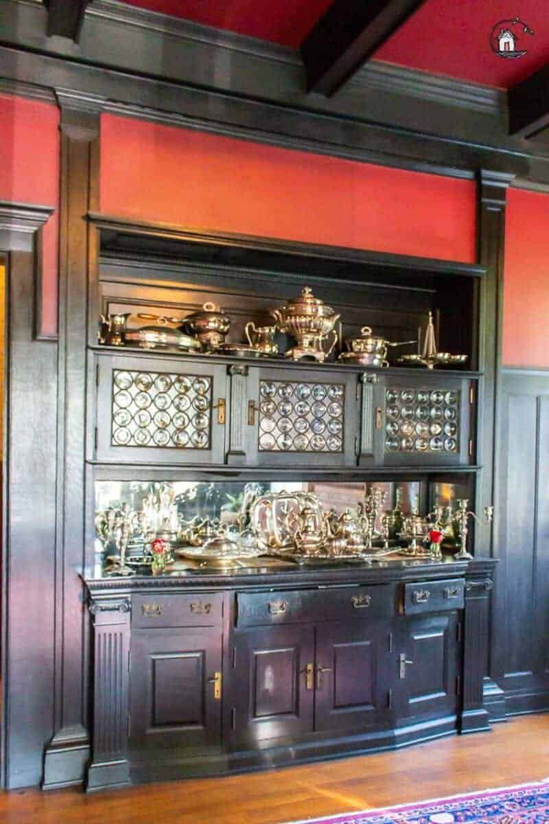 Photo of black stained wood built in buffet in the Vrooman Mansion. 