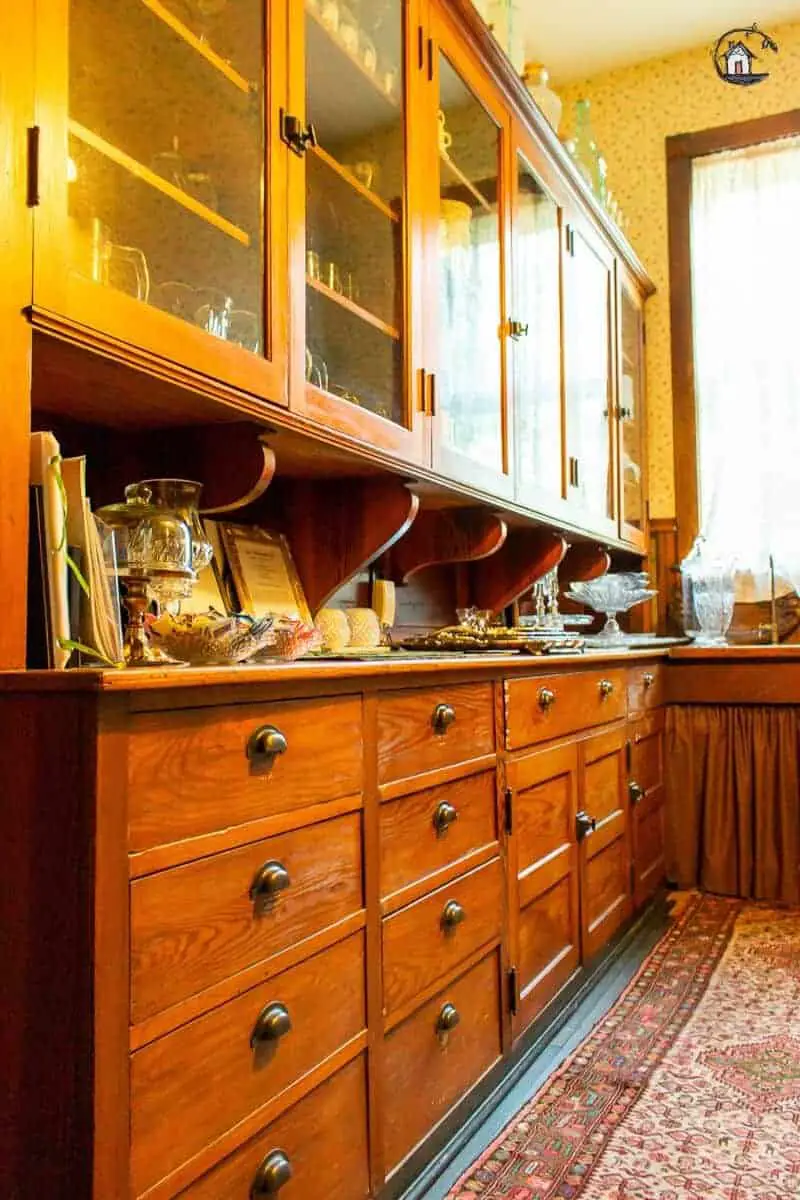 Photo of wood cabinets in the Vrooman Mansion butler's pantry. 