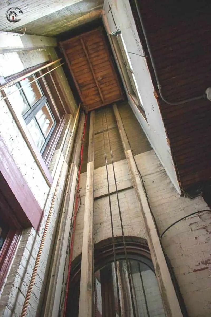 Photo of the luggage lift hoist way inside the Vrooman Mansion. 