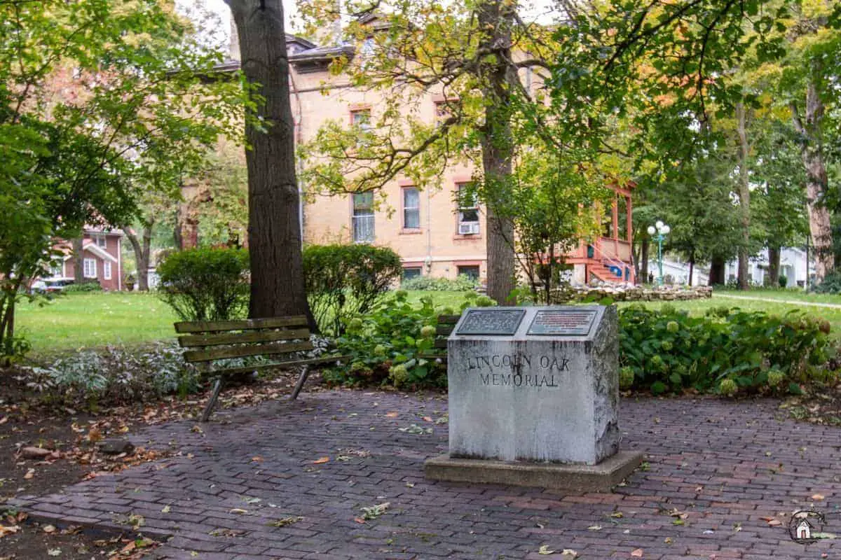 Photo of granite monument in the location of the Lincoln Oak at the Vrooman Mansion. 