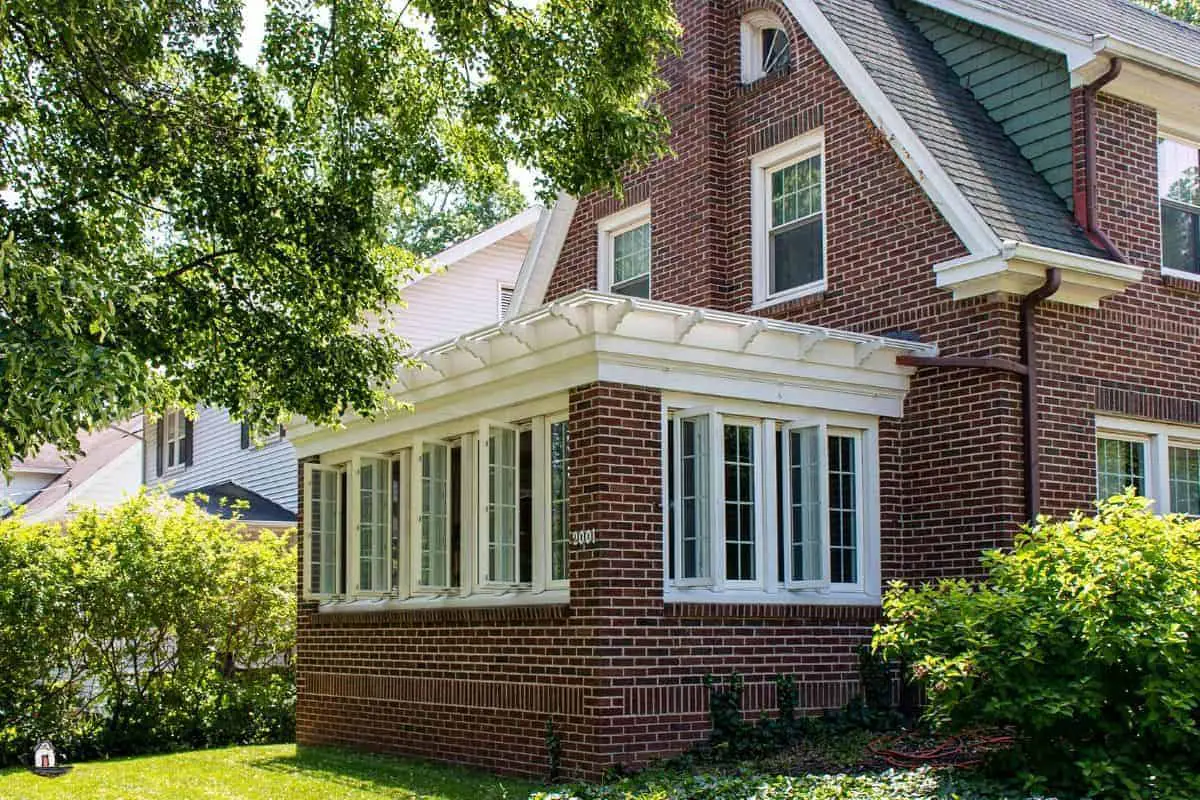 Photo of an older red brick home that could teach new houses a few lessons. 