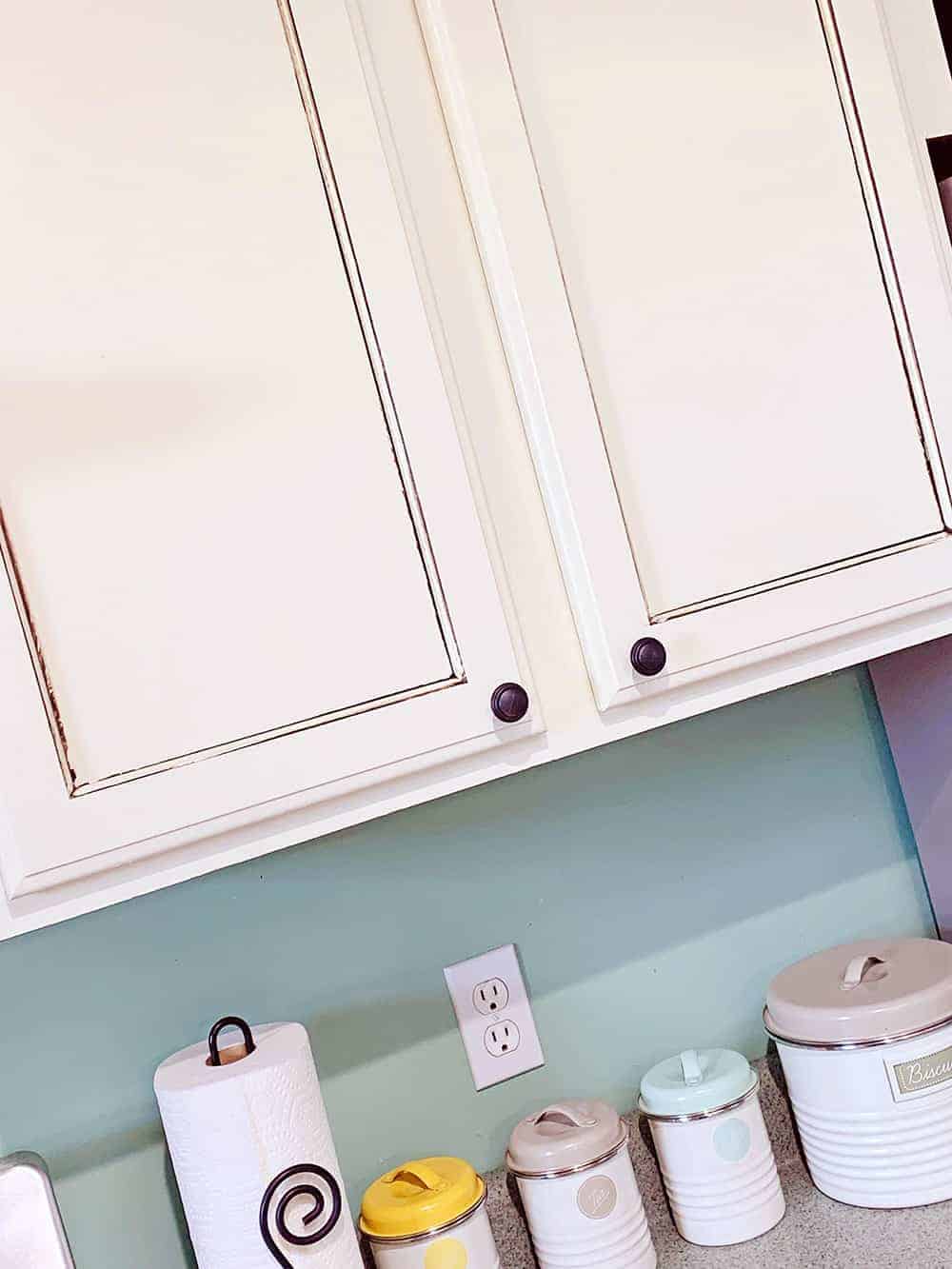 close up of white painted kitchen cabinets