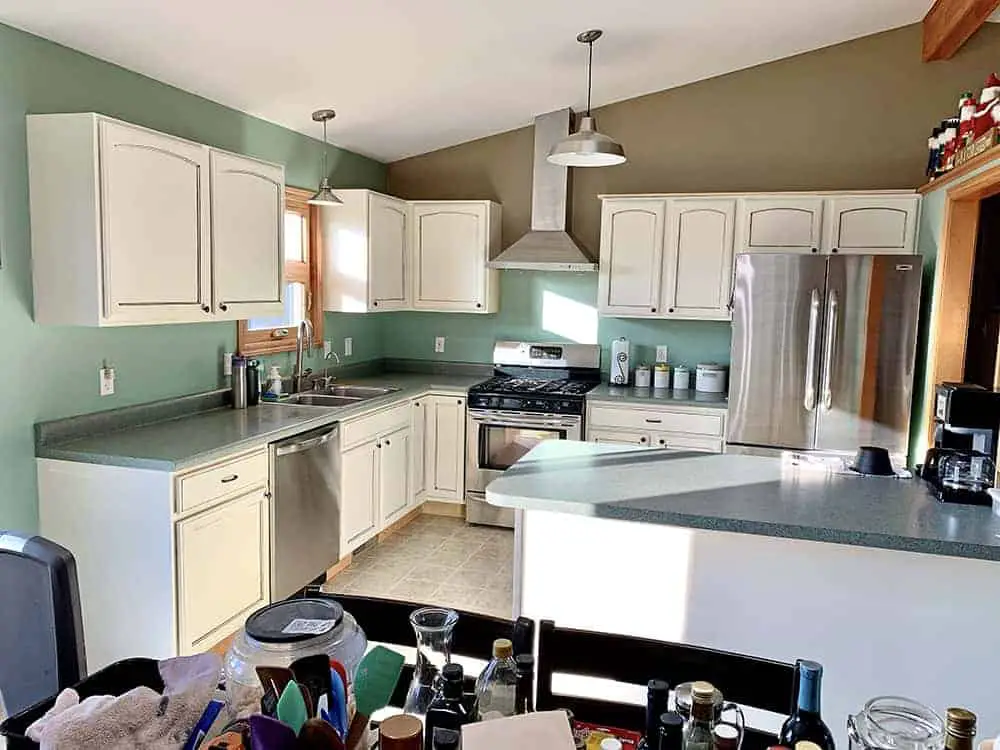 kitchen with painted white cabinets