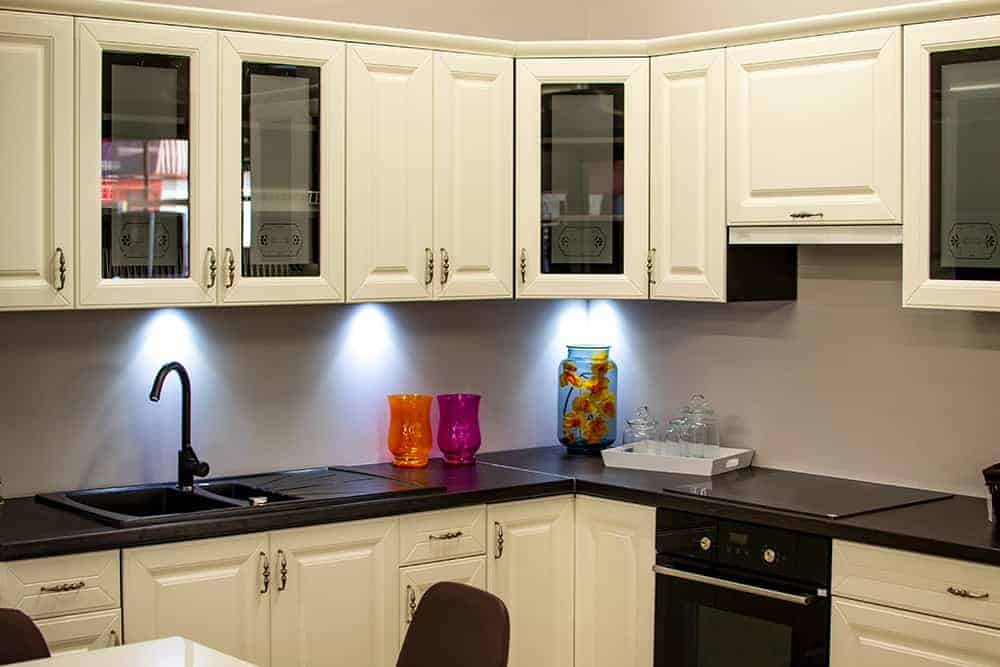 white kitchen cabinets with glass doors