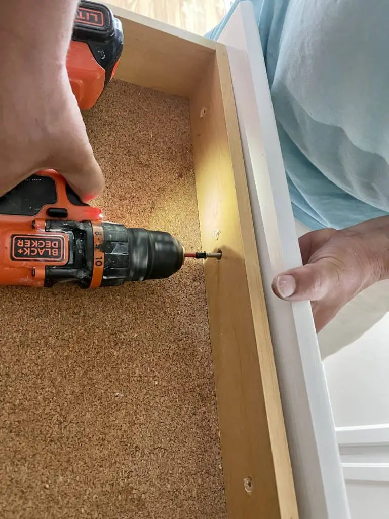 How to Paint Kitchen Cabinets that are Stained 29 drilling cabinet drawer back onto base