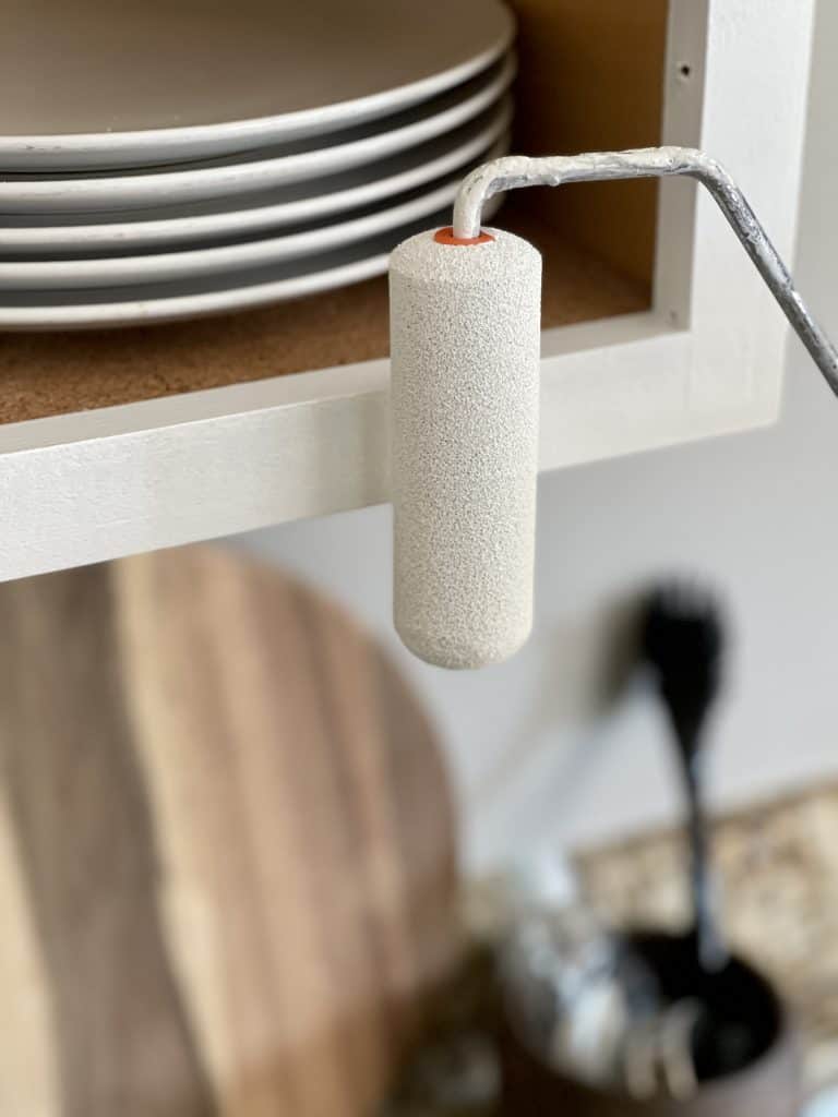 How to Paint Kitchen Cabinets that are Stained 24 small paint roller with white paint